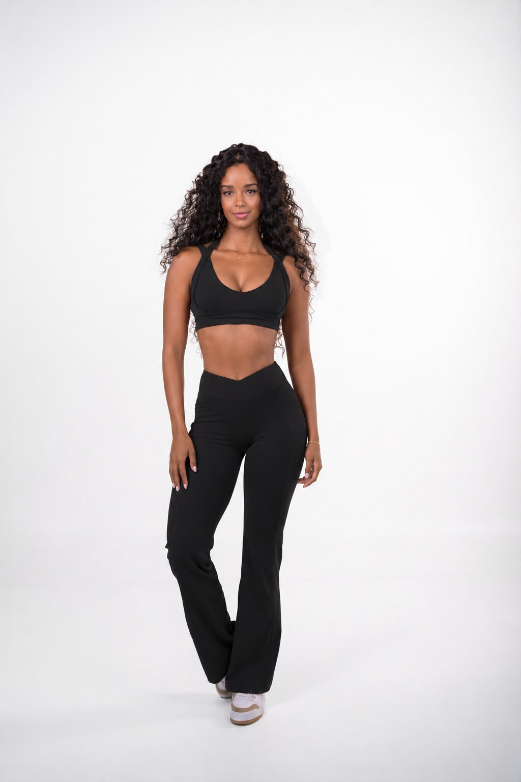 Black VELVET SET, V-neck sports bra and high-waisted flare pants, front view