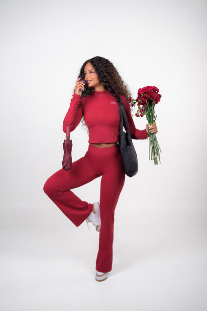 Burgundy MERLOT JACKET, cropped zip-up jacket with a stand-up collar, full length, worn with the Velvet Set pants